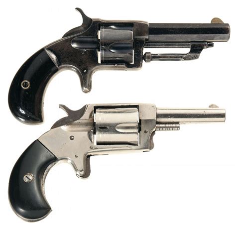 Two Antique Spur Trigger Revolvers