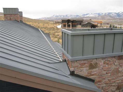 Zinc Standing Seam Roof With Zinc Chimney And Stainless Steel Snow