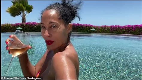 Tracee Ellis Ross 48 Flaunts Her Age Defying Figure In A Floral Bikini While Hanging By The