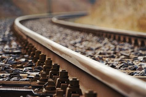 Close Up Photo Of Rail Tracks · Free Stock Photo