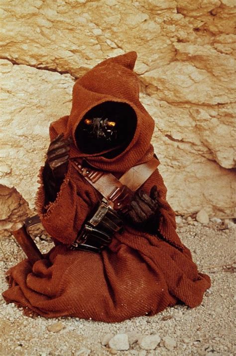 What do Jawas look like without their hoods on? These pics give a clue.