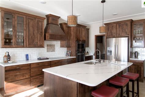 Oak kitchen cabinets with granite countertops. Cambria Brittanicca Dark Cabinets Backsplash Ideas