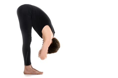 Standing Forward Fold Yoga Pose Of The Week Standing Forward Fold