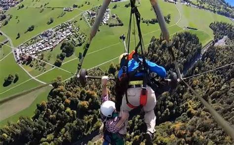 Hang Glider Clings On After Pilot Forgets To Attach Him Properly