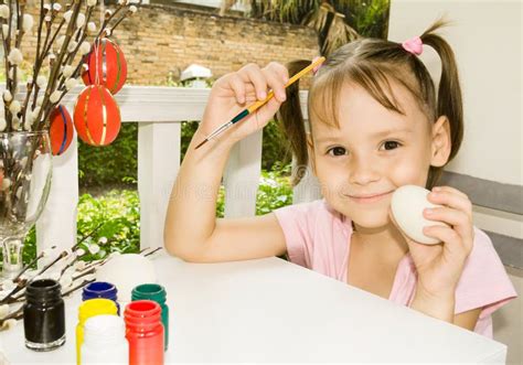 Little Girl Painting Easter Eggs Stock Photo Image Of Beautiful