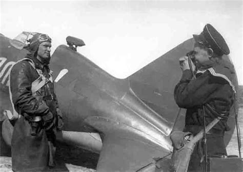 soviet pilots boris safonov and evgeny khaldey of the 72nd cap mixed aviation regiment of the