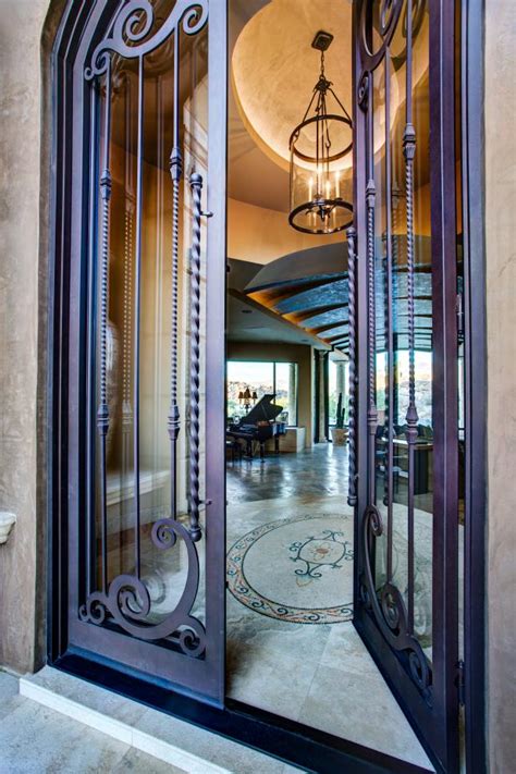 A wide variety of lowes wrought iron front doors options are available to you, such as project solution capability, open style, and design style. Home Entry with Glass and Wrought Iron Door, Featuring ...