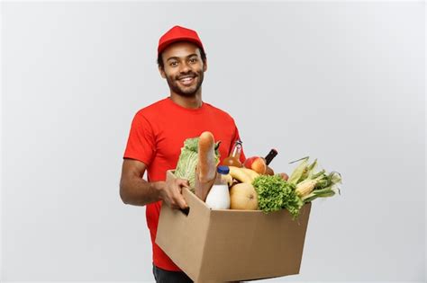 Delivery Concept Handsome African American Delivery Man Carrying