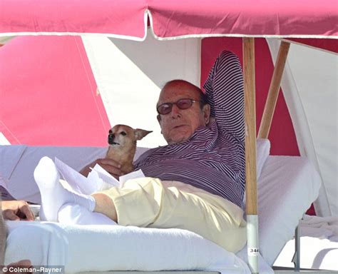 Clive Davis Pictured With A Male Pal And His Chihuahua In