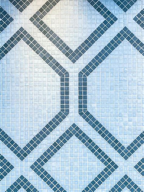 A Tiled Wall With A Blue And White Pattern Photo Tile Image On Unsplash