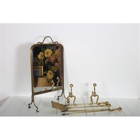 A 19th Century Brass And Mirrored Painted Firescreen Together With A