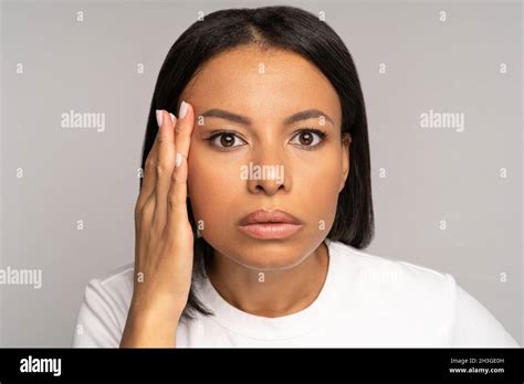 Worried Woman Look At Wrinkles Aging Face Skin And Crows Feet Around