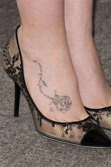 Striking rose tattoo on foot for males. Pin on Tattoos