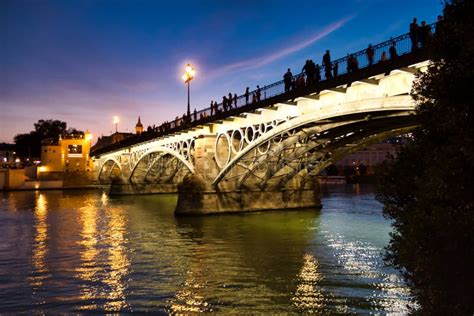 Night Photo Of The Triana Bridge Stock Photo Image Of Alfonso