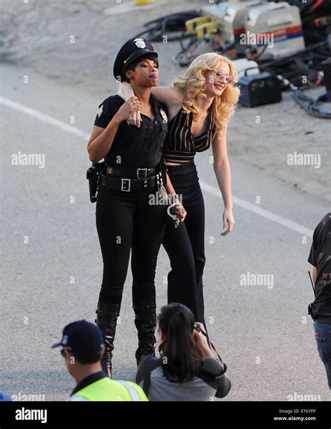 pop star iggy azalea gets arrested by jennifer hudson who plays as a police officer for their