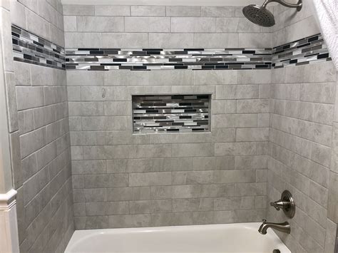 The alcove bathtub is all about maximizing your space: Bathroom remodel | Shower tile designs, Bathrooms remodel ...