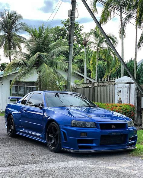 The front overhang of the car is. Nissan Skyline r34 gtr : carporn