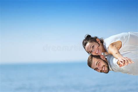 Beach Couple Laughing In Love Romance On Travel Honeymoon Vacation