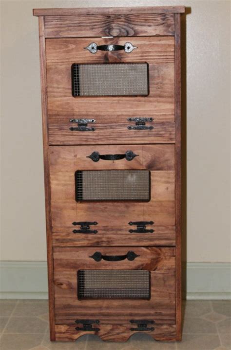 This potato bin is the ideal choice if you want to combine utility with the looks, as the cupboard has a beautiful design. Potato Bin wood Storage Rustic Primitive Kitchen wooden ...