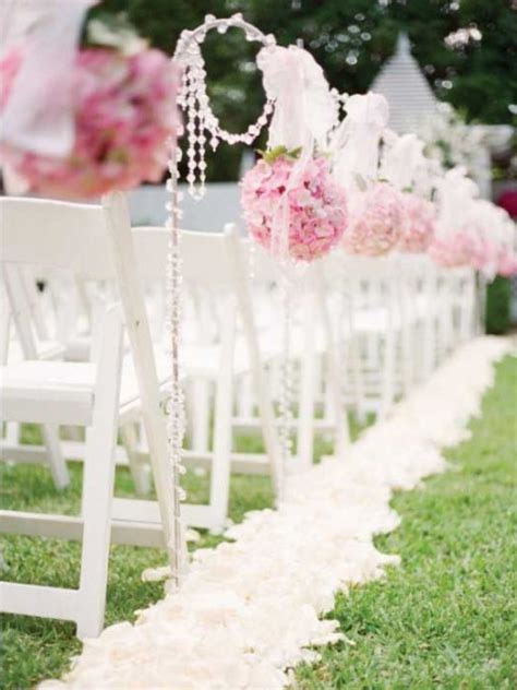 She walks down it alone or holding the arm of a loved one but walks back with a companion for for the couple, the aisle is the stage for the most important walk of their lives. Outdoor Wedding Aisle Decoration Ideas | Decoratingspecial.com