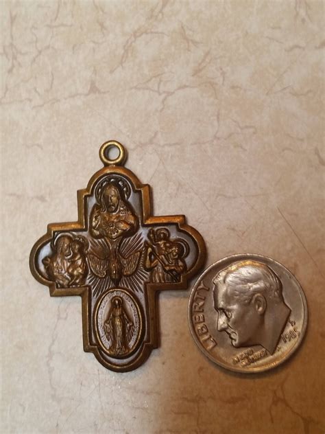 ornate antiqued brass catholic medal with special detail etsy