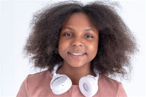 Close Up Of Cheerful Preteen African American Girl With Curly Hair