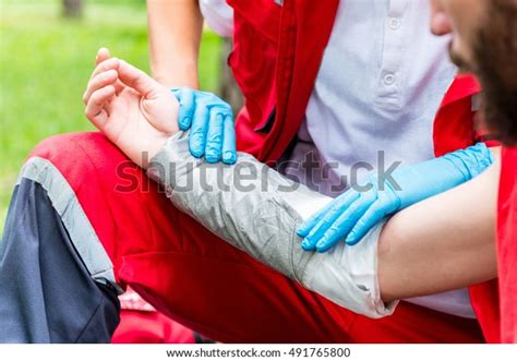 Medical Worker Treating Burns On Males Stock Photo Edit Now 491765800