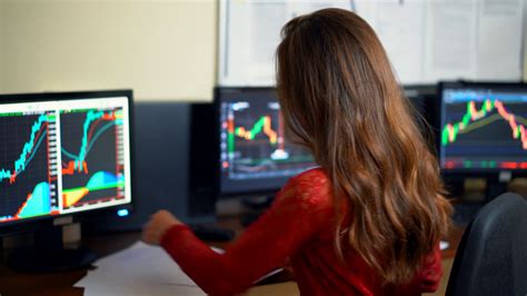 Female Stock Market Trader Looks At Stock Footage Sbv 326175082