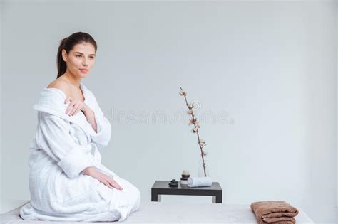 Attractive Gentle Young Woman In Bathrobe In Spa Salon Stock Image