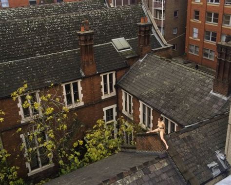 This Woman Sat NAKED On A Roof For Four Hours And This Is Why