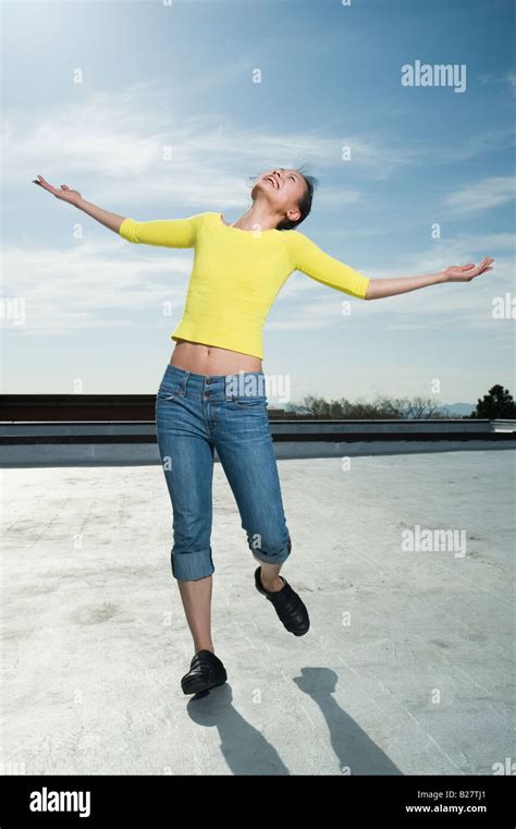Woman With Arm Outstretched Stock Photo Alamy