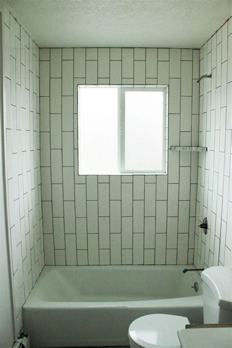 Only this time in a wainscoting version. How to Tile a Shower/Tub Surround, Part 1: Laying the Tile