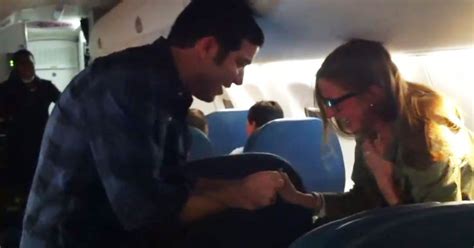 Watch A Guy Propose To His Girlfriend On An Airplane Clickable Vulture
