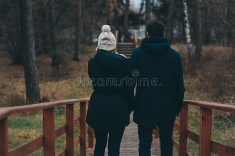 Loving Young Couple Happy Together Outdoor On Cozy Walk In Forest Stock