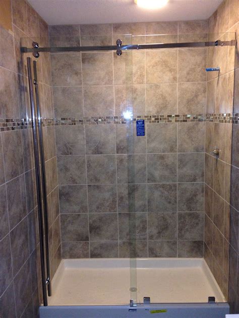 frameless serenity series shower with a sliding panel door and fixed panel 72 commercial ladd