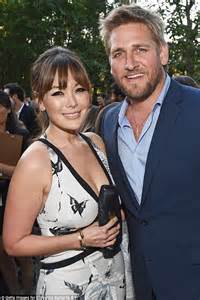 Lindsay Price Cuddles Up To Curtis Stone In Low Cut Dress At Chrysalis
