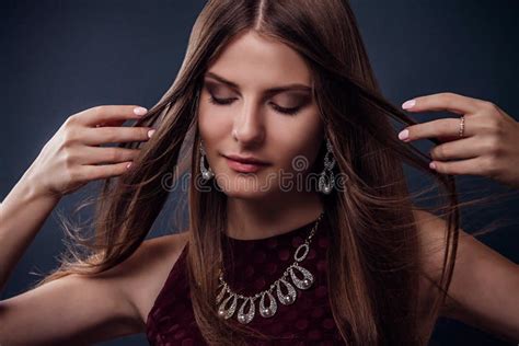 Beautiful Woman With Long Hair Wearing Jewellery Stock Photo Image Of
