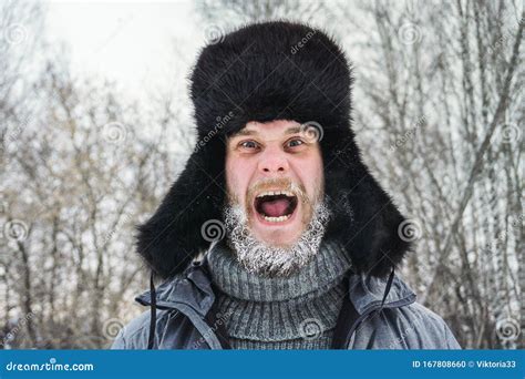 Siberian Russian Man With A Beard In Hoarfrost In Freezing Cold In The