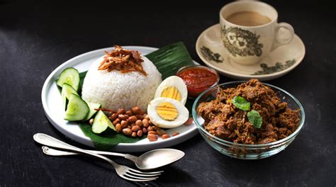 A light meal that is believed to be malay in origin, it is traditionally accompanied by fried anchovies, sliced cucumbers, fried fish known as ikan selar, and a sweet chili sauce. Nasi Lemak: An Origin Story | Buro 24/7 MALAYSIA