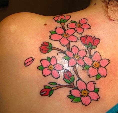 Cherry blossom tattoos for women. Small & simple flowers cherry blossom tattoo on shoulder