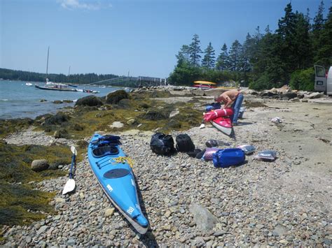 Outdoor Enthusiast Sea Kayaking And Camping On The Maine Island Trail