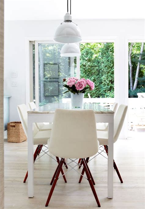 Table In Front Of Large Window With Garden View Dining Room Design