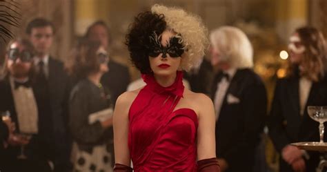 She's flanked by two henchmen in the photo, too, which helps paint a vivid picture of the world of the upcoming film. Emma Stone Is Brilliant, Bad, And A Little Bit… Joker In 'Cruella' Trailer