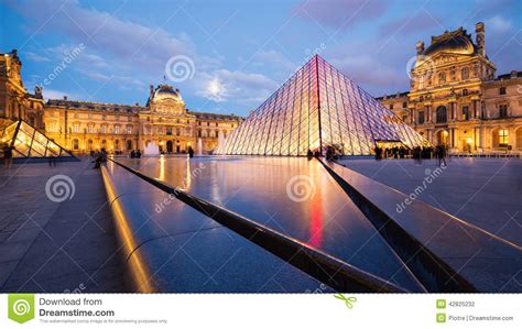 View Of The Louvre Museum And The Pyramid At Twilight Editorial