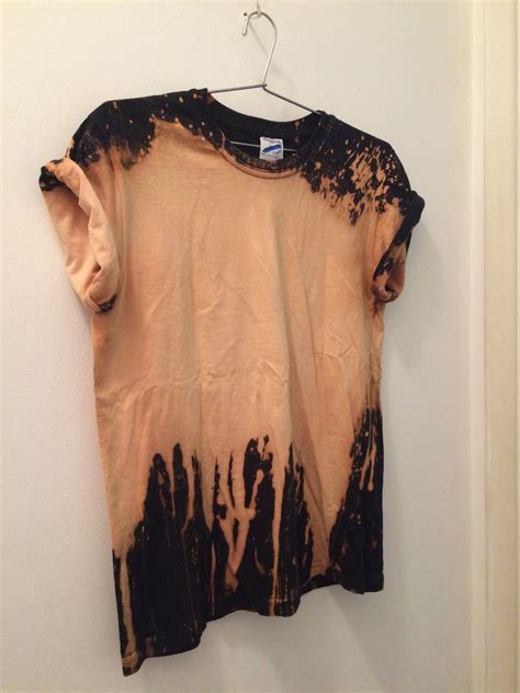 Diy tutorial for using bleach and stencils to make one of a kind shirts, table cloths, what have you. Bleached t-shirt | T shirt diy, Bleach t shirts, Diy shirt