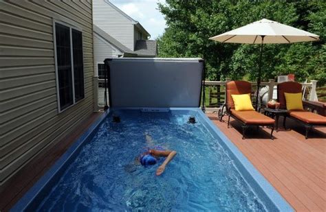 A Backyard Endless Pool Swim Spa Built Into This Custom Deck Was