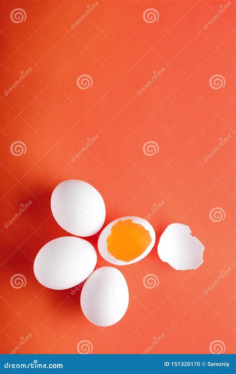 Cracked And Whole Chicken Eggs On Color Background Stock Photo Image