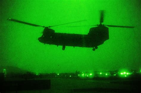 As Seen Through A Night Vision Device A Ch 47 Chinook Helicopter
