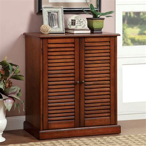 How do you hide your shoes, coats, bags and other everyday essentials, so they don't become an eyesore in your entrance? Darby Home Co Polton Louvre 20-Pair Shoe Storage Cabinet ...