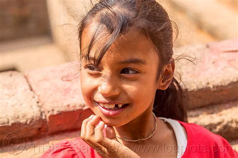 little nepali girl smiling nepal
